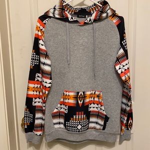 ZyFG free sweatshirt hoodie. Women’s Med. Gray heather and Aztec polyester blend